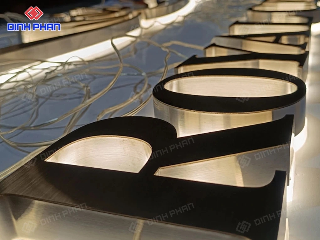 gia cong chu inox hat sang chan 9