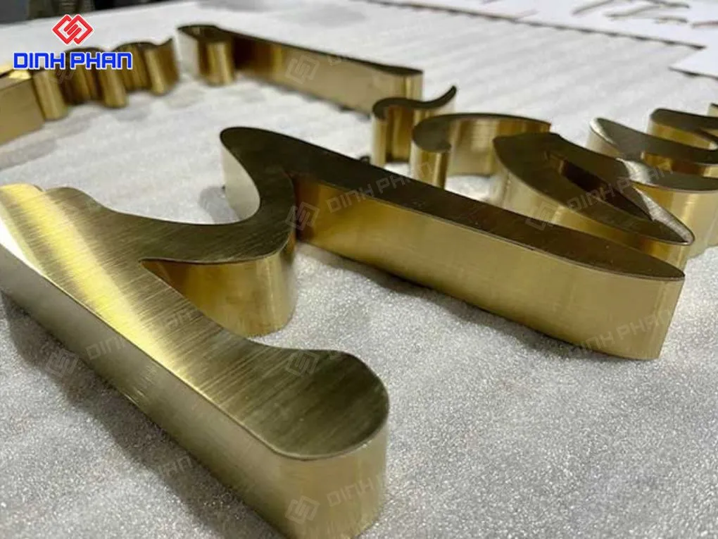 Làm chữ inox vàng xước 