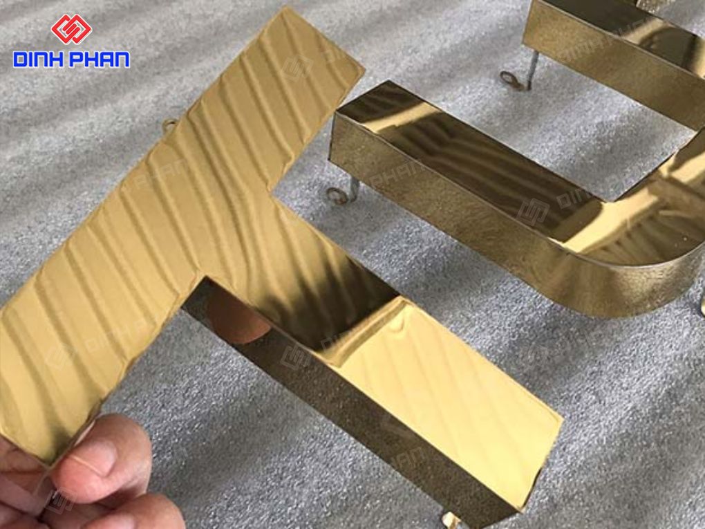 Gia công chữ inox vàng gương 